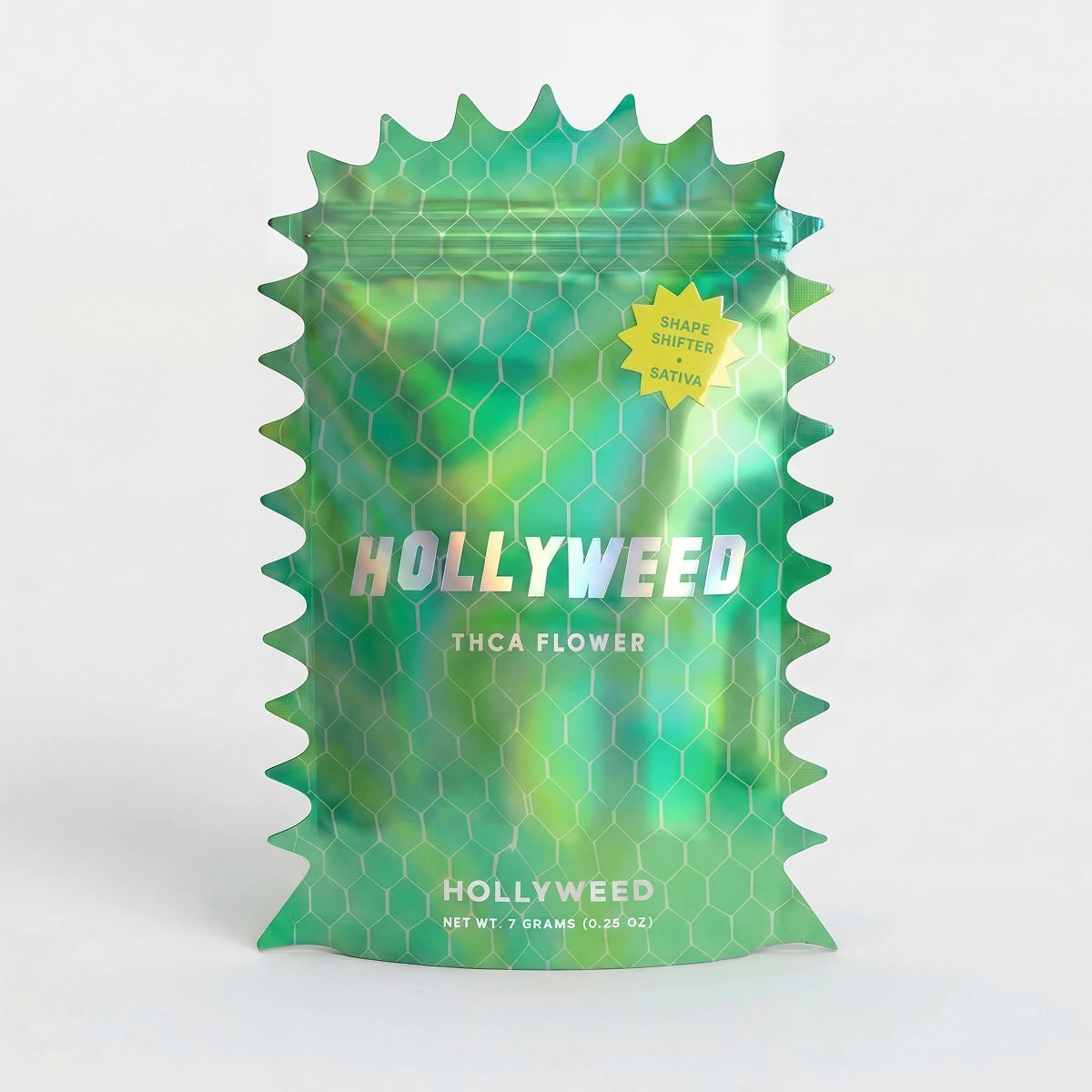 Hollyweed THCA Flower Shape Shifter Sativa in 7g mylar bag showing vibrant green buds and orange pistils.