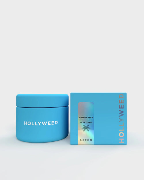 Hollyweed Green Crack THCA flower in jar with box, showcasing vibrant green sativa cannabis buds.