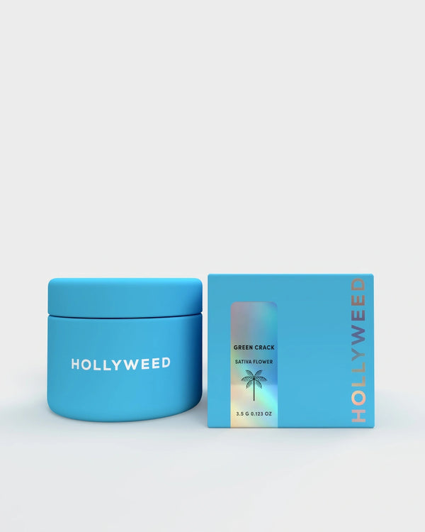 Hollyweed Green Crack THCA flower in jar with box, showcasing vibrant green sativa cannabis buds.